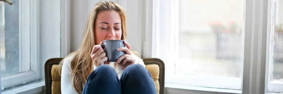 ahb_preparing-bodywork-treatment-therapy Woman with hot drink illustrating being prepared for bodywork treatment, bodywork therapy, and healing journey